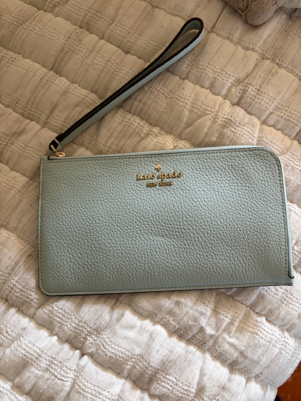 kate spade Light Blue Pebbled Leather Wristlet with Gold Logo